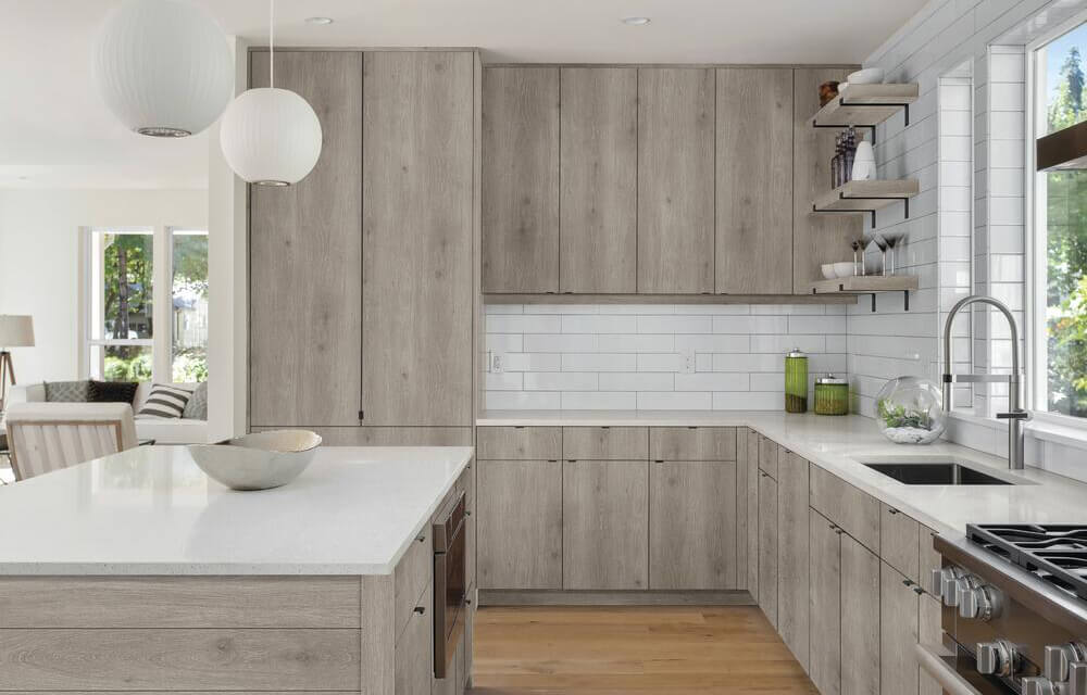 Open, accessible kitchen layout with lower counters and clear floor space